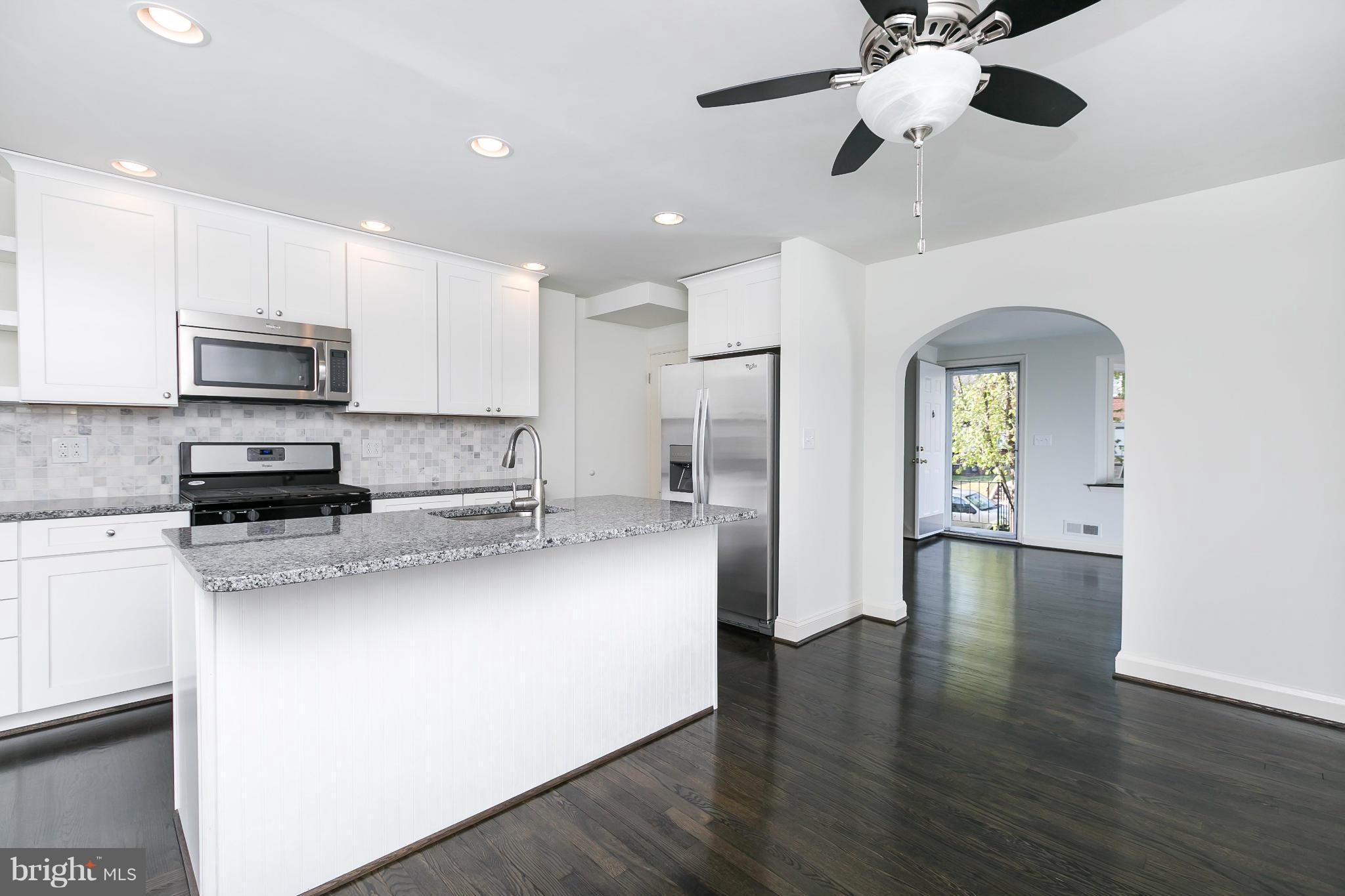 1636 Aberdeen Road Baltimore, MD 21286 - Photo 11 of 30 a kitchen with stainless steel appliances a refrigerator sink and stove