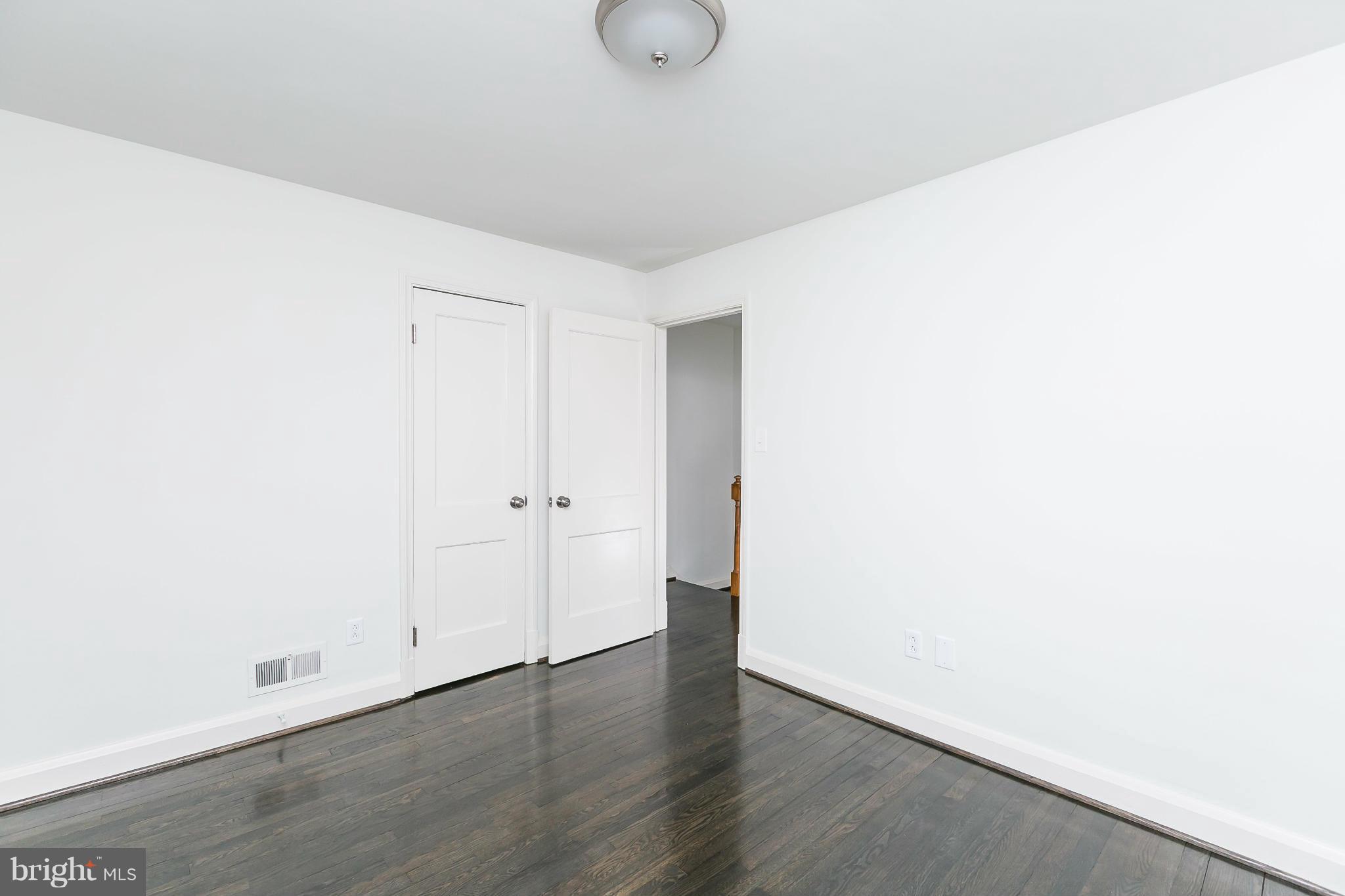 1636 Aberdeen Road Baltimore, MD 21286 - Photo 20 of 30 a view of an empty room with wooden floor