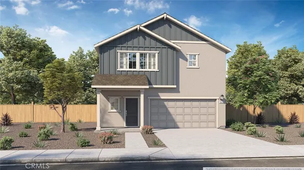 a front view of a house with garage