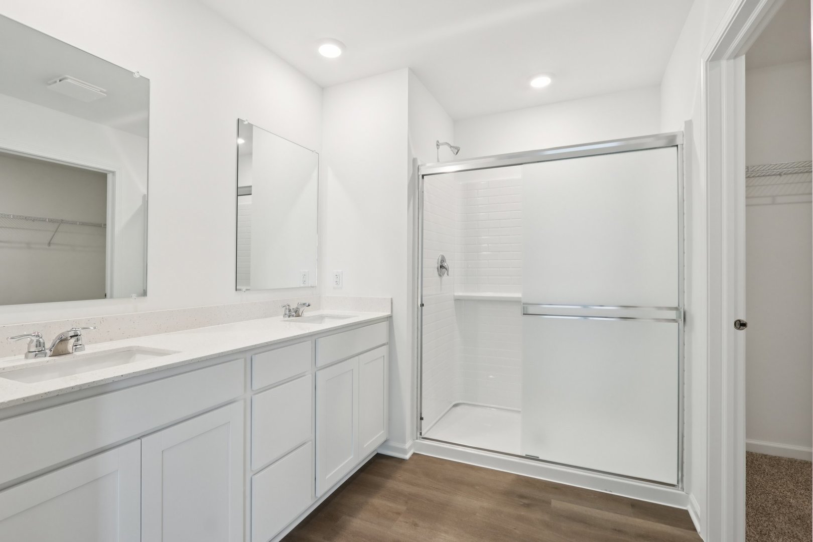 2957 Rushmore Drive Pingree Grove, IL 60140 - Photo 15 of 36 a bathroom with a double vanity sink mirror and double