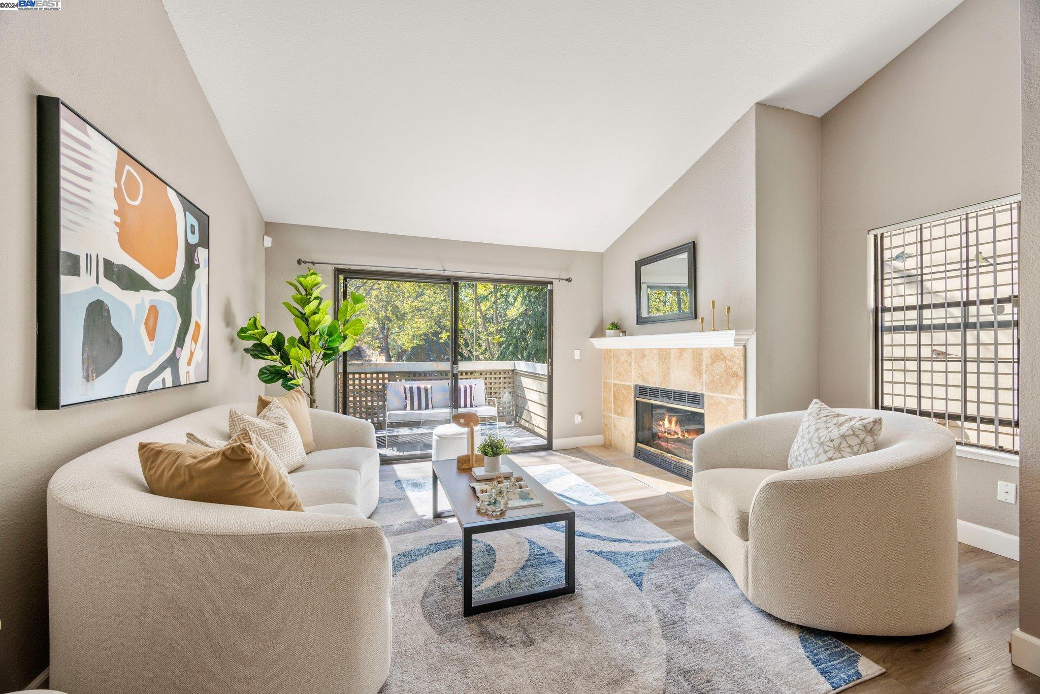 377 Eastridge Drive San Ramon, CA 94582 - Photo 1 of 1 a living room with furniture fireplace and a large window