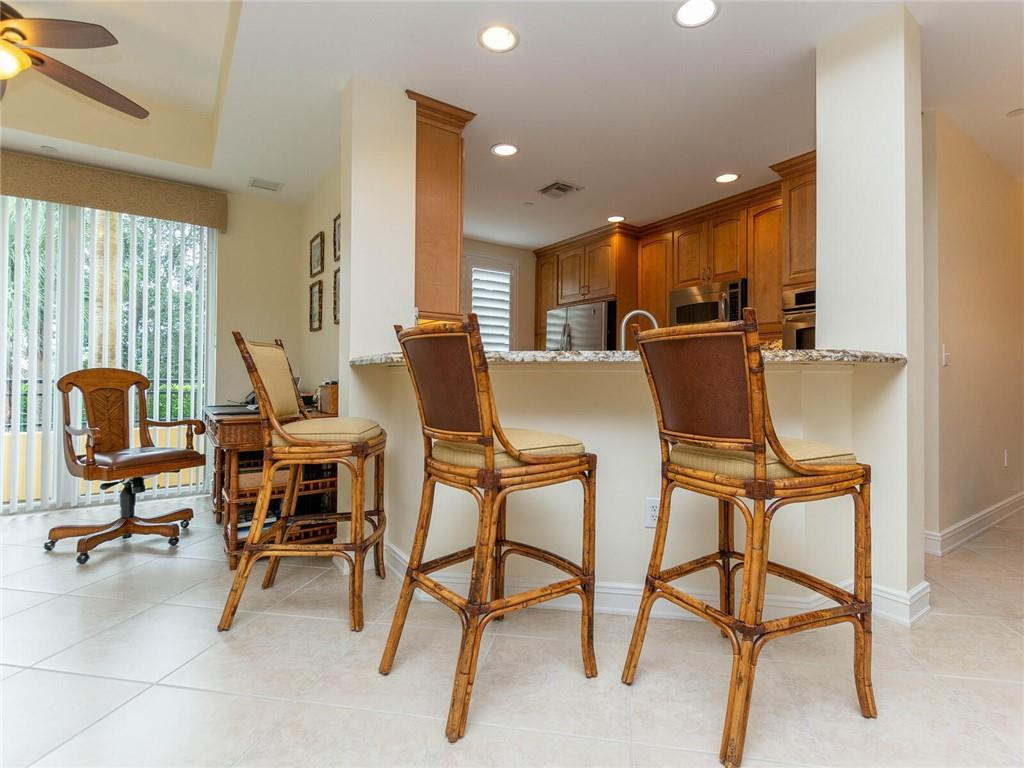 16101 Emerald Estates Drive, Unit 252 Weston, FL 33331 - Photo 12 of 51 a view of a dining room with furniture