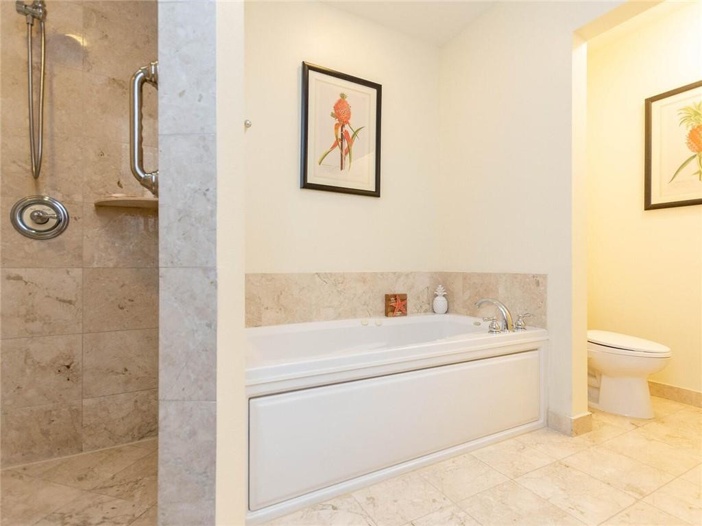 16101 Emerald Estates Drive, Unit 252 Weston, FL 33331 - Photo 19 of 51 a bathroom with a sink a toilet and a shower