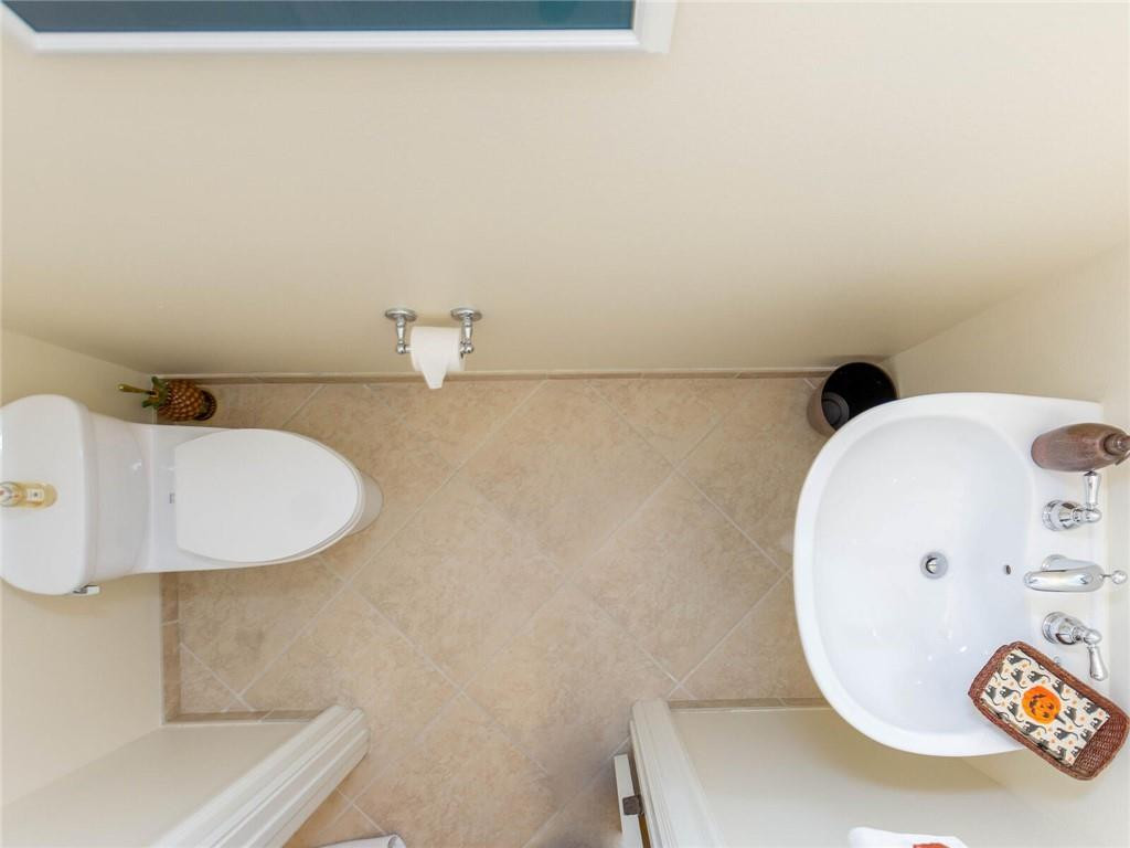 16101 Emerald Estates Drive, Unit 252 Weston, FL 33331 - Photo 32 of 51 a bathroom with a sink and a mirror