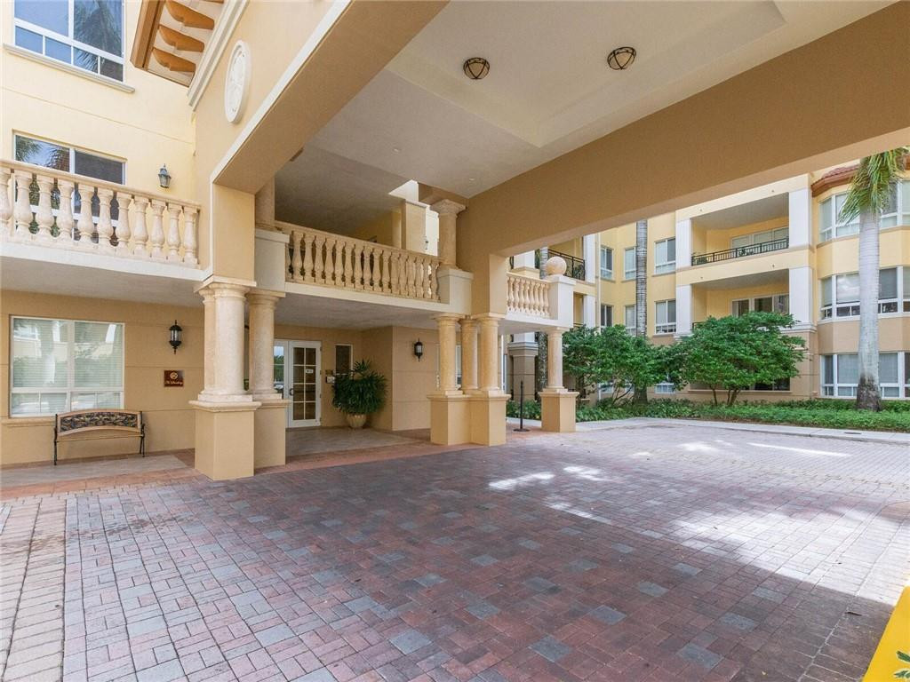 16101 Emerald Estates Drive, Unit 252 Weston, FL 33331 - Photo 36 of 51 a view of a building with a porch