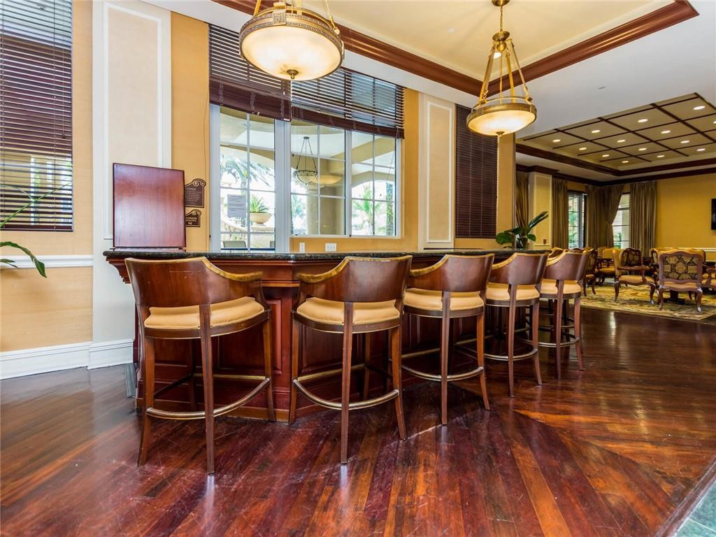 16101 Emerald Estates Drive, Unit 252 Weston, FL 33331 - Photo 45 of 51 a view of a dining room with furniture window and wooden floor