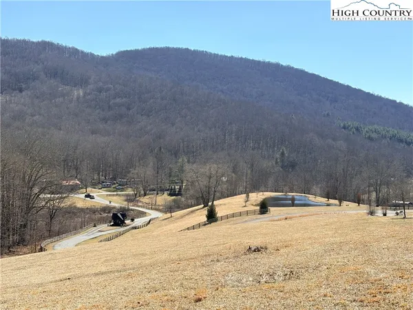 a view of a fireplace with a flat screen tv