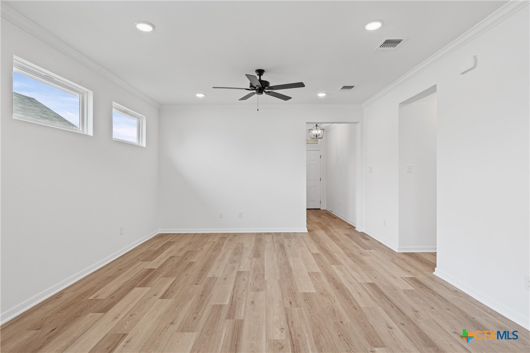 8019 Pineridge Way Temple, TX 76502 - Photo 11 of 32 an empty room with a fan and a ceiling fan