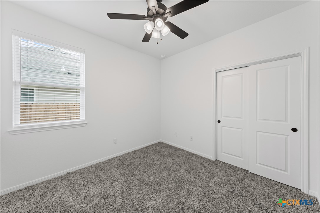 8019 Pineridge Way Temple, TX 76502 - Photo 18 of 32 a view of an empty room with a window