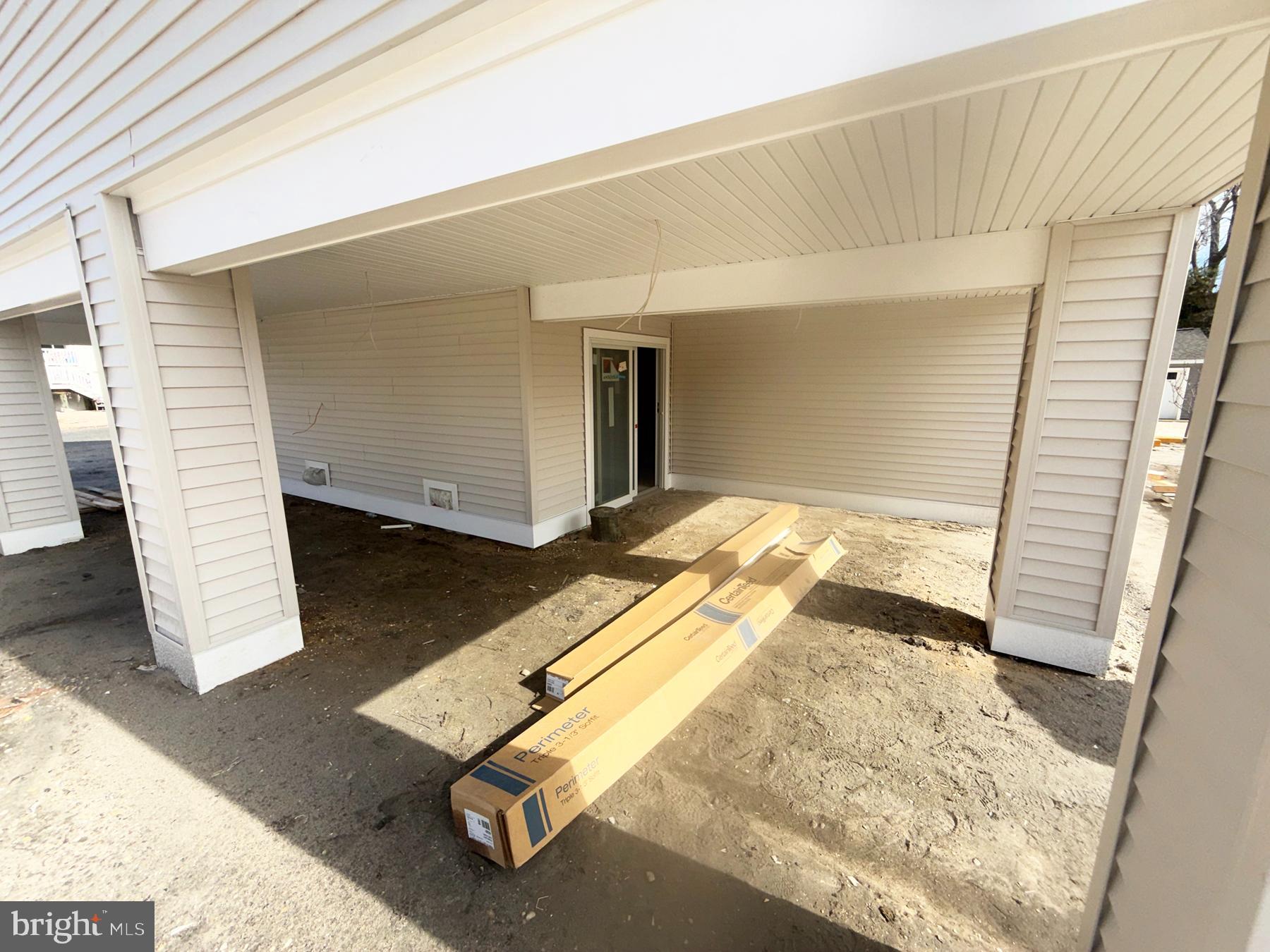 354 West 11th Street Ship Bottom, NJ 08008 - Photo 16 of 38 a view of a room with wooden floor and windows