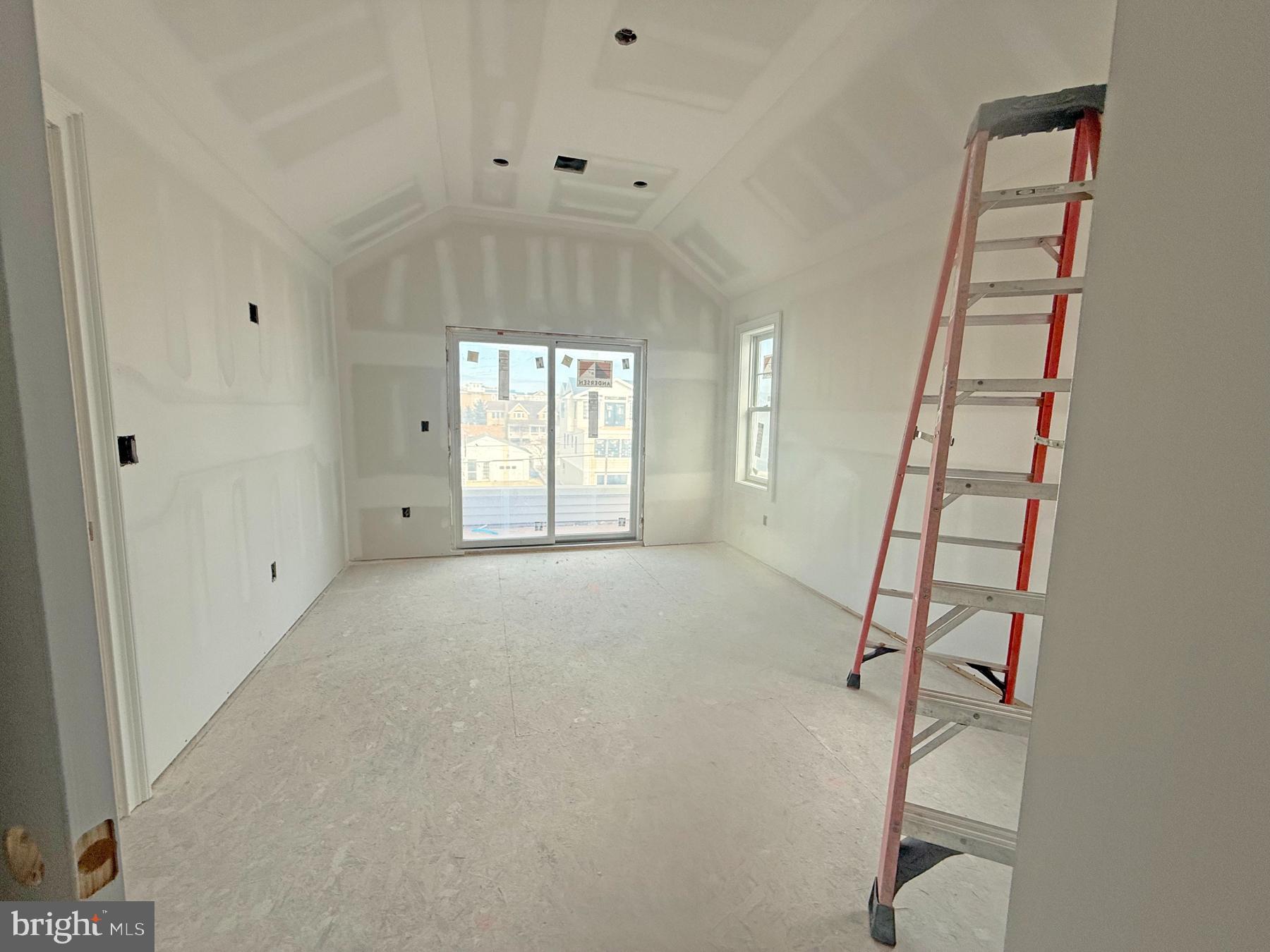 354 West 11th Street Ship Bottom, NJ 08008 - Photo 21 of 38 wooden floor in an entryway with a window