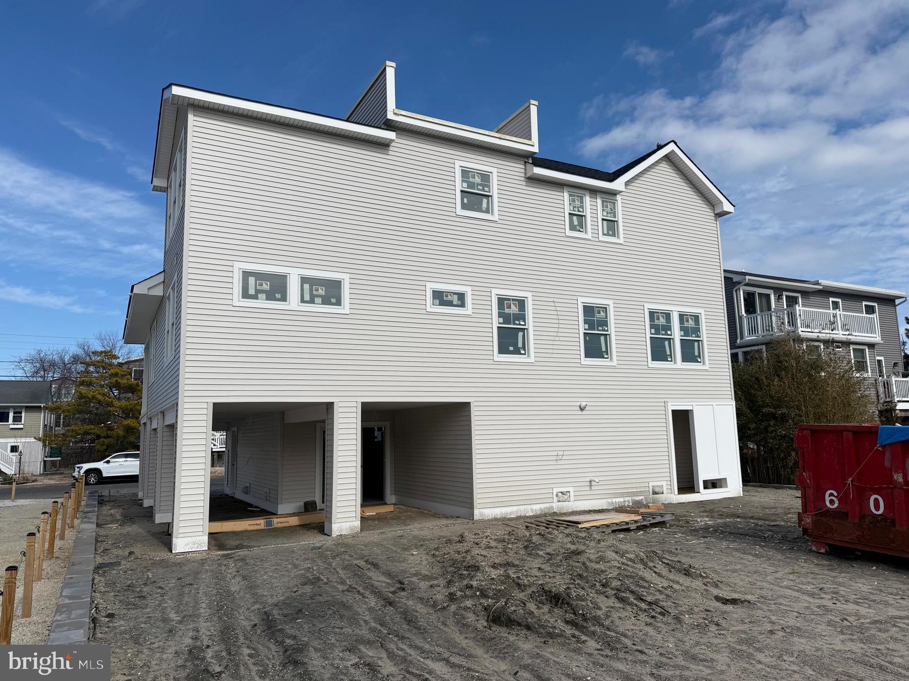 354 West 11th Street Ship Bottom, NJ 08008 - Photo 25 of 38 a front view of a house with parking space