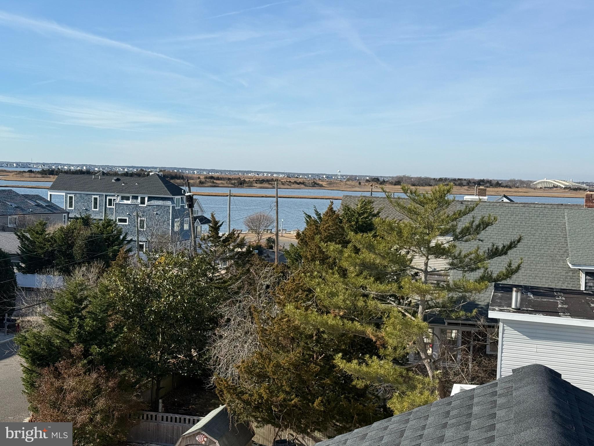 354 West 11th Street Ship Bottom, NJ 08008 - Photo 3 of 38 a view of a lake with a city