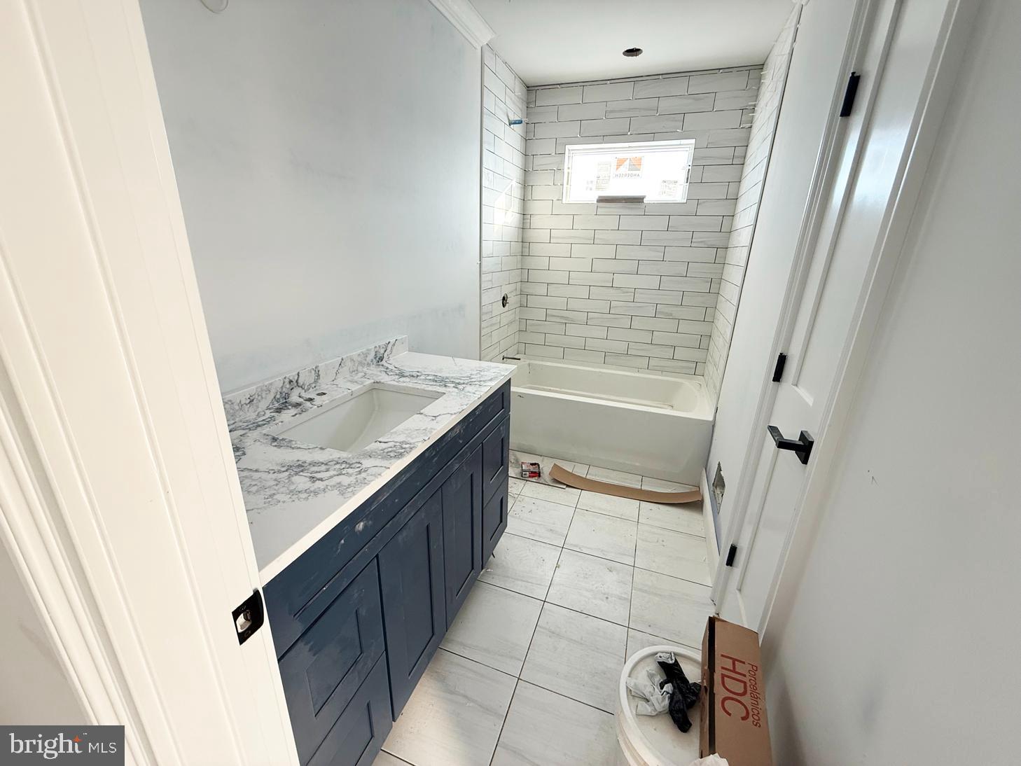 354 West 11th Street Ship Bottom, NJ 08008 - Photo 35 of 47 Another tiled hallway bath