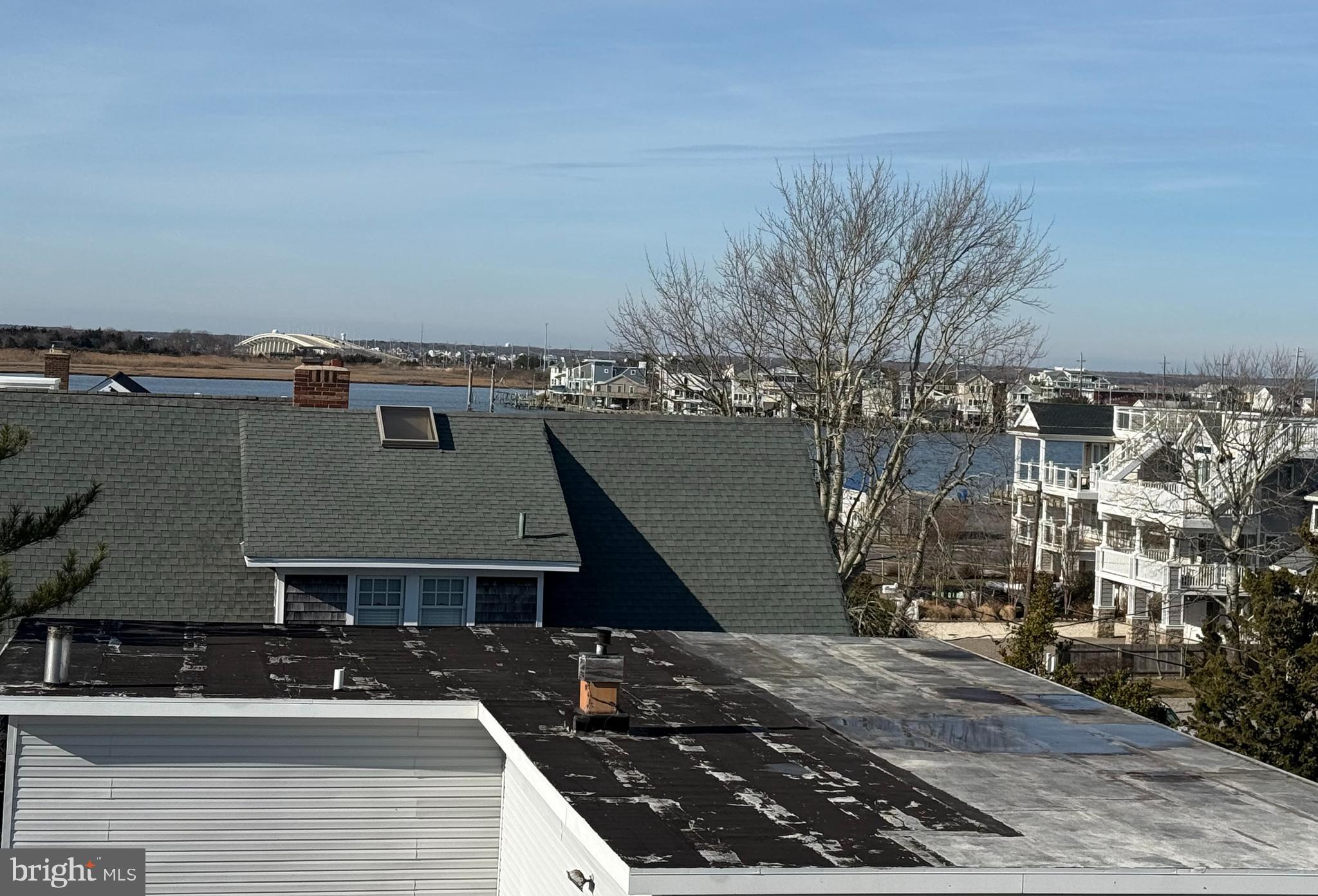 354 West 11th Street Ship Bottom, NJ 08008 - Photo 5 of 17 a front view of a house with a yard