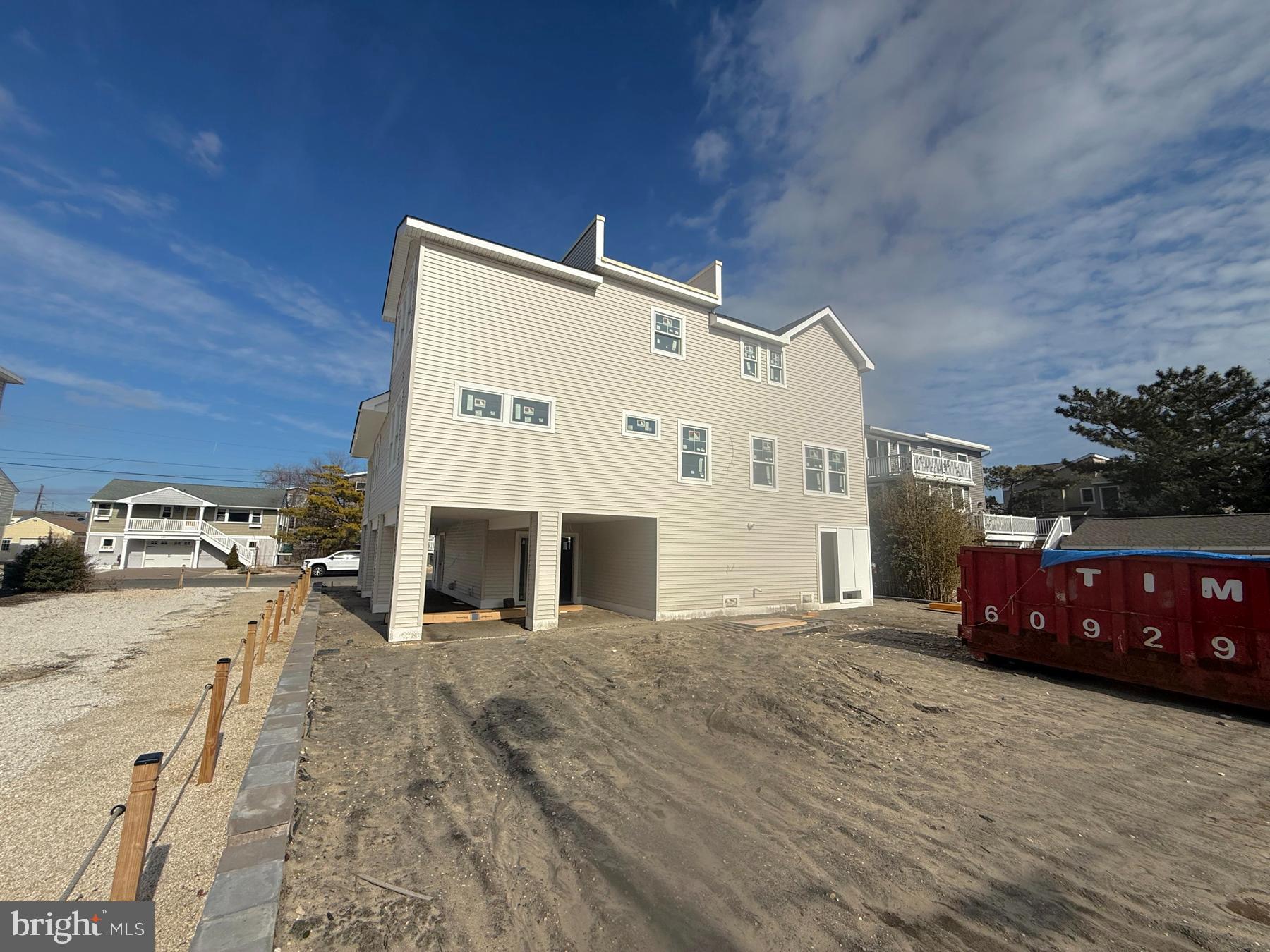354 West 11th Street Ship Bottom, NJ 08008 - Photo 6 of 38 a front view of a building with parking space and parking space