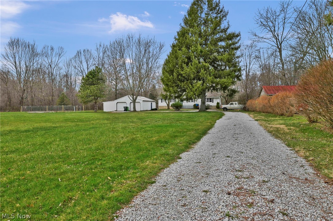 259 East Ohio Avenue Rittman, OH 44270 - Photo 4 of 41 View of yard featuring a house