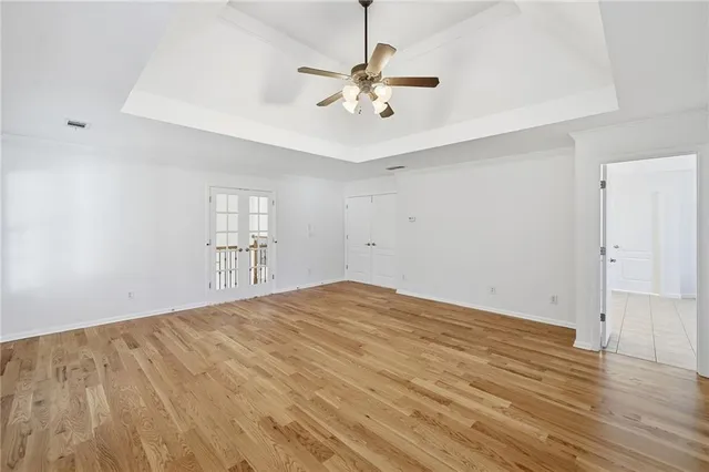 a spacious bathroom with a sink vanity and mirror