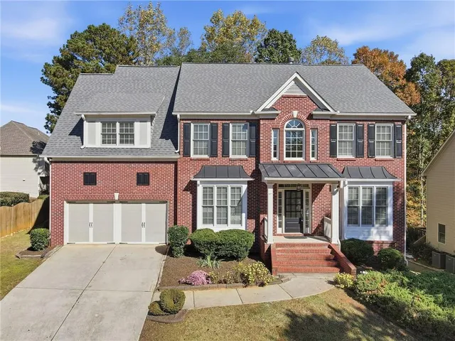 front view of house with a yard