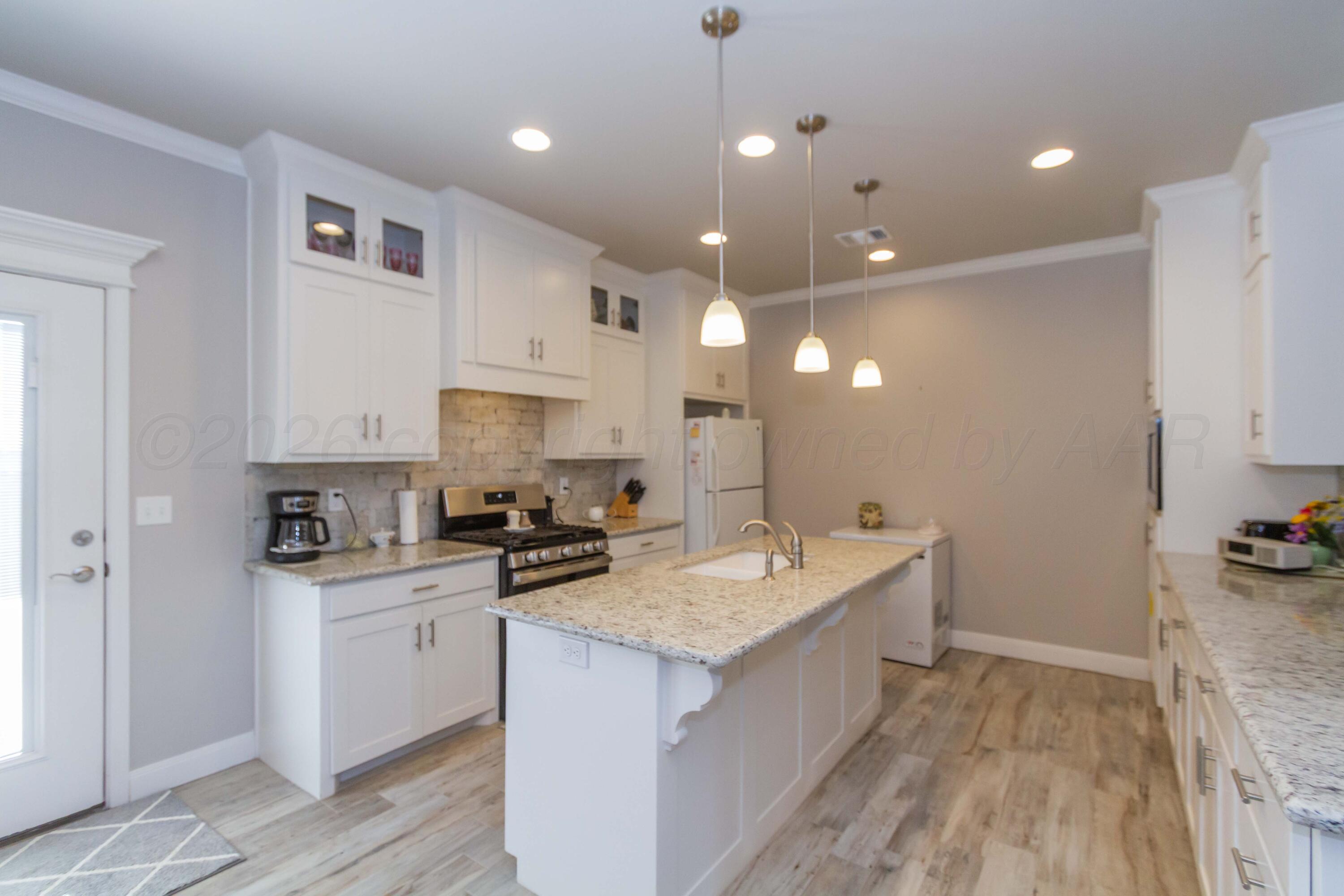6909 Tatum Circle Amarillo, TX 79119 - Photo 4 of 33 KITCHEN VIEW 1