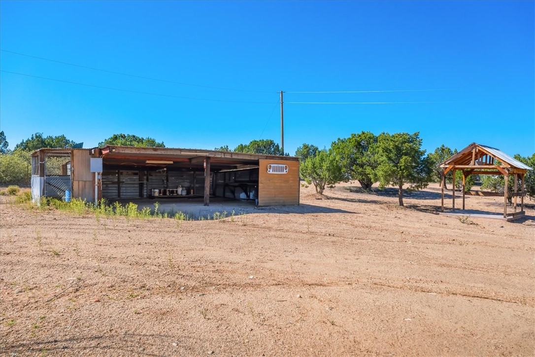 10374 East Happy Trails Road Kingman, AZ 86401 - Photo 44 of 68 a view of a house with a yard