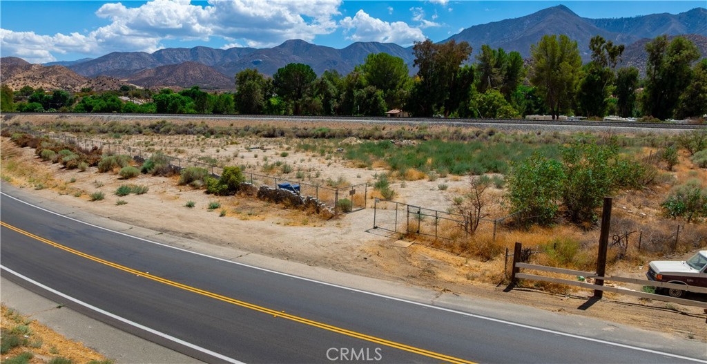 0 Crown Valley Rd Vista Acton, CA 93510 - Photo 15 of 19 a view of a yard with a bench and trees around