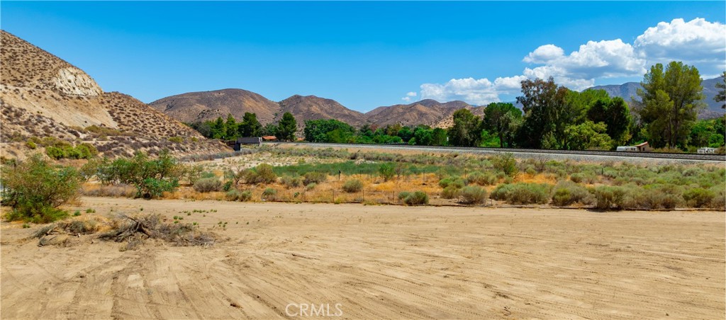 0 Crown Valley Rd Vista Acton, CA 93510 - Photo 16 of 19 a view of a yard with an umbrella