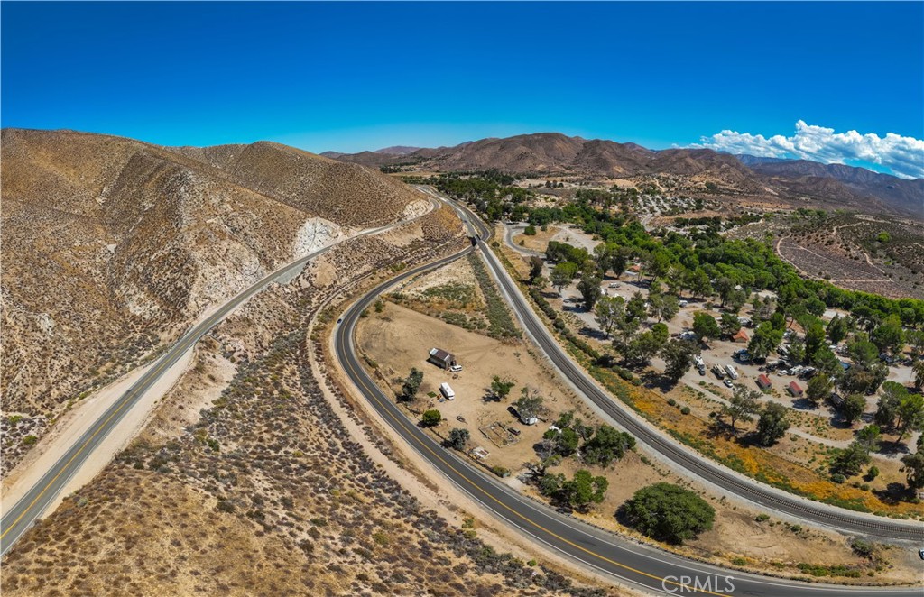 0 Crown Valley Rd Vista Acton, CA 93510 - Photo 3 of 19 a view of a forest with mountains in the background