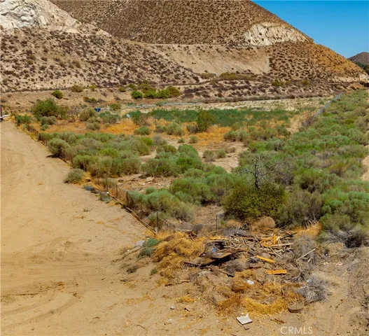 a view of a lake from a balcony