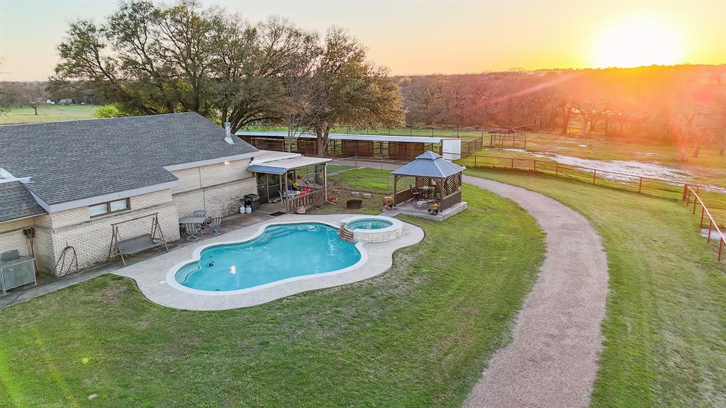 304 Scarlett Road Weatherford, TX 76087 - Photo 4 of 32 swimming pool view with a outdoor seating