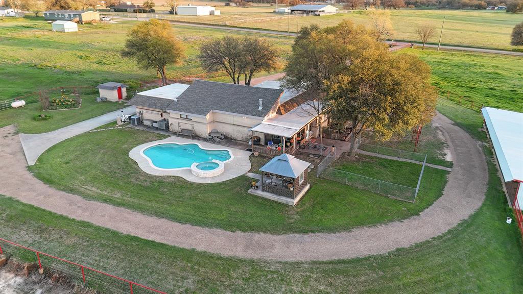 304 Scarlett Road Weatherford, TX 76087 - Photo 5 of 32 an aerial view of a house having yard