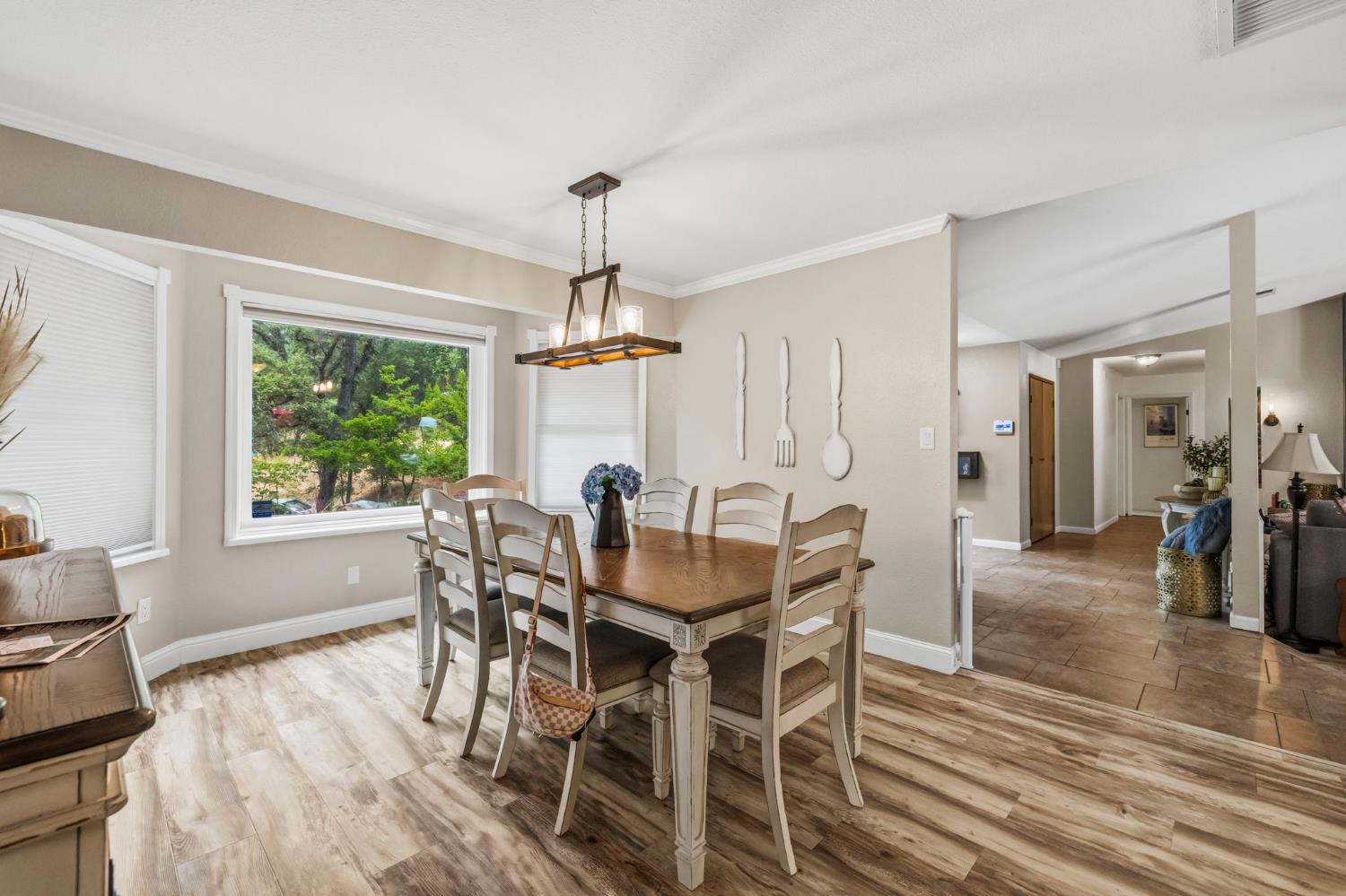 11460 Racetrack Road Sonora, CA 95370 - Photo 10 of 46 a view of a dining room with furniture window and wooden floor