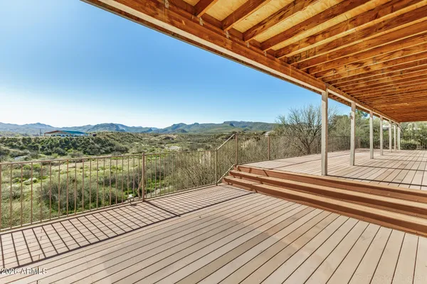 a view of garage and a yard