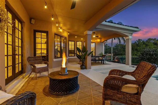 a view of pool with outdoor seating