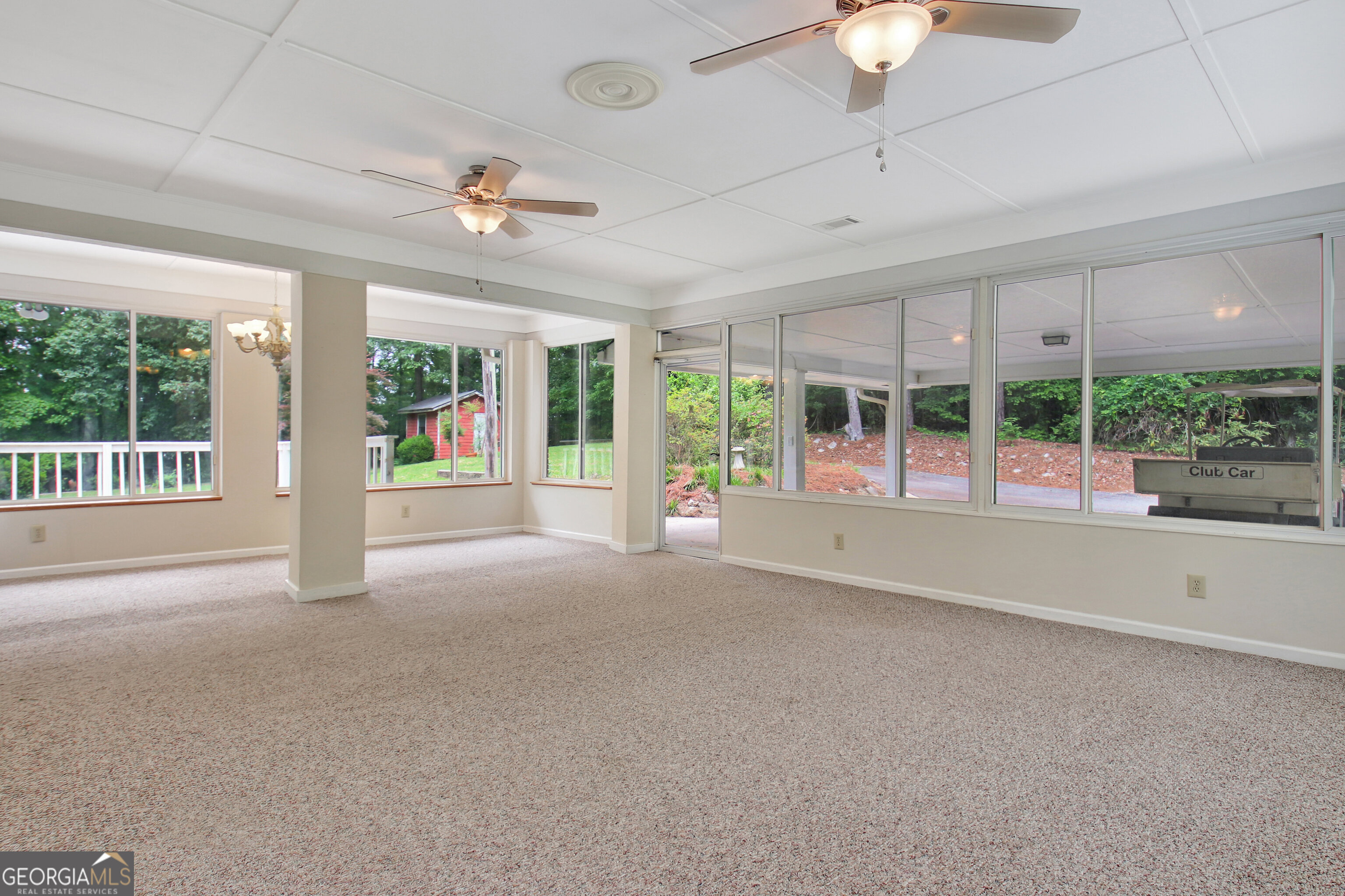 717 Tyrone Road Tyrone, GA 30290 - Photo 21 of 58 a view of an empty room with a balcony