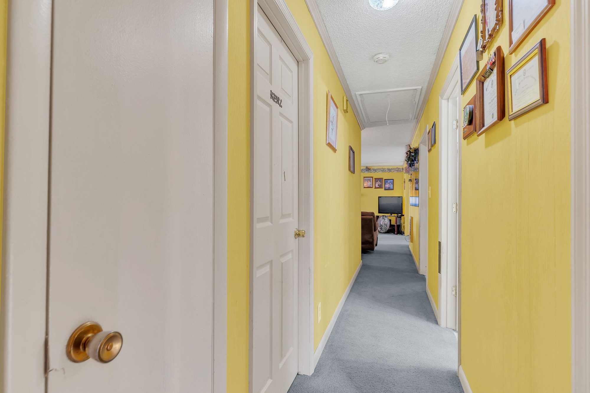 999 Sixteenth Model Road Manchester, TN 37355 - Photo 20 of 24 a view of a hallway with wooden shelves