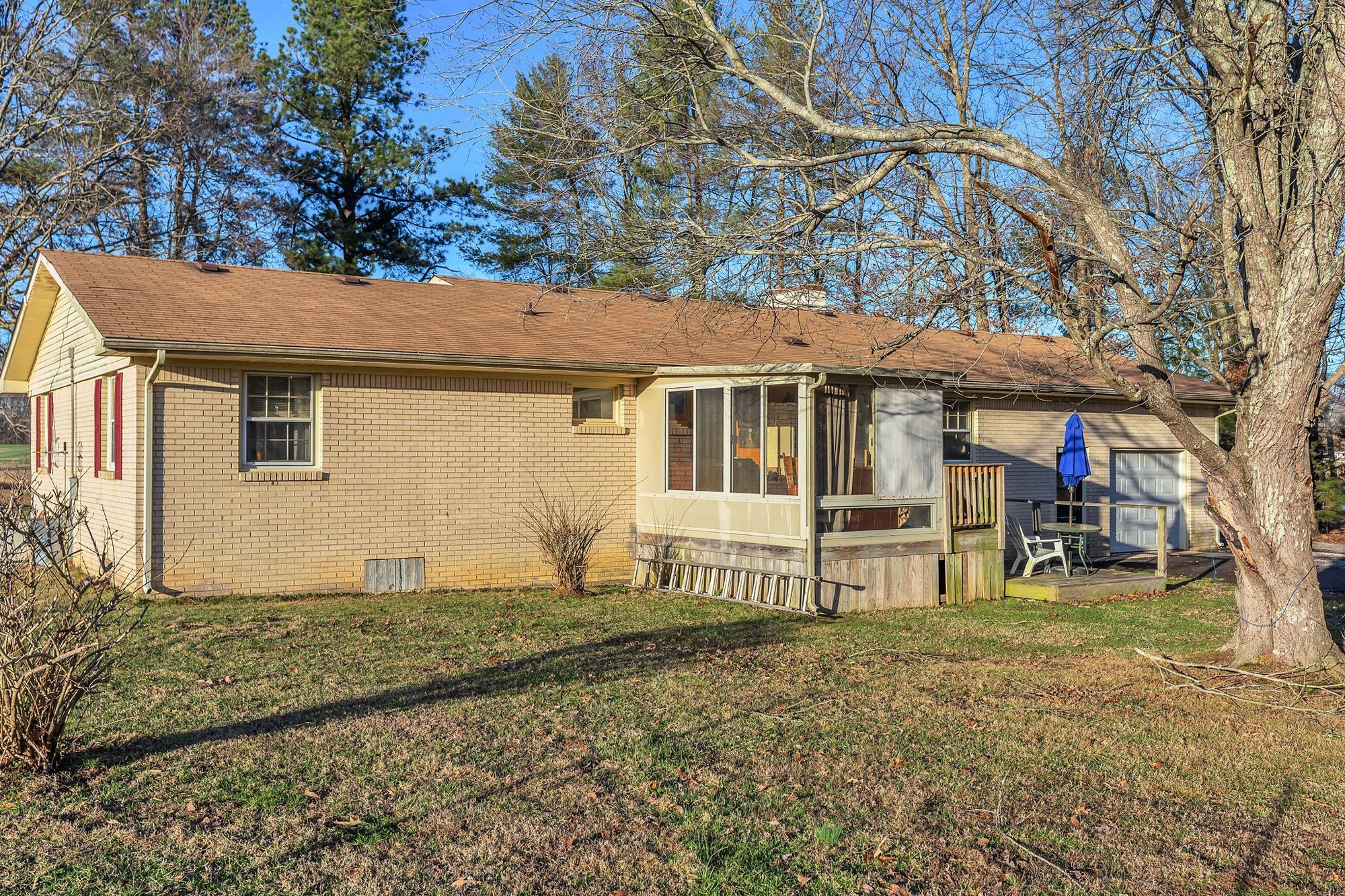 999 Sixteenth Model Road Manchester, TN 37355 - Photo 21 of 24 a view of a house with a yard