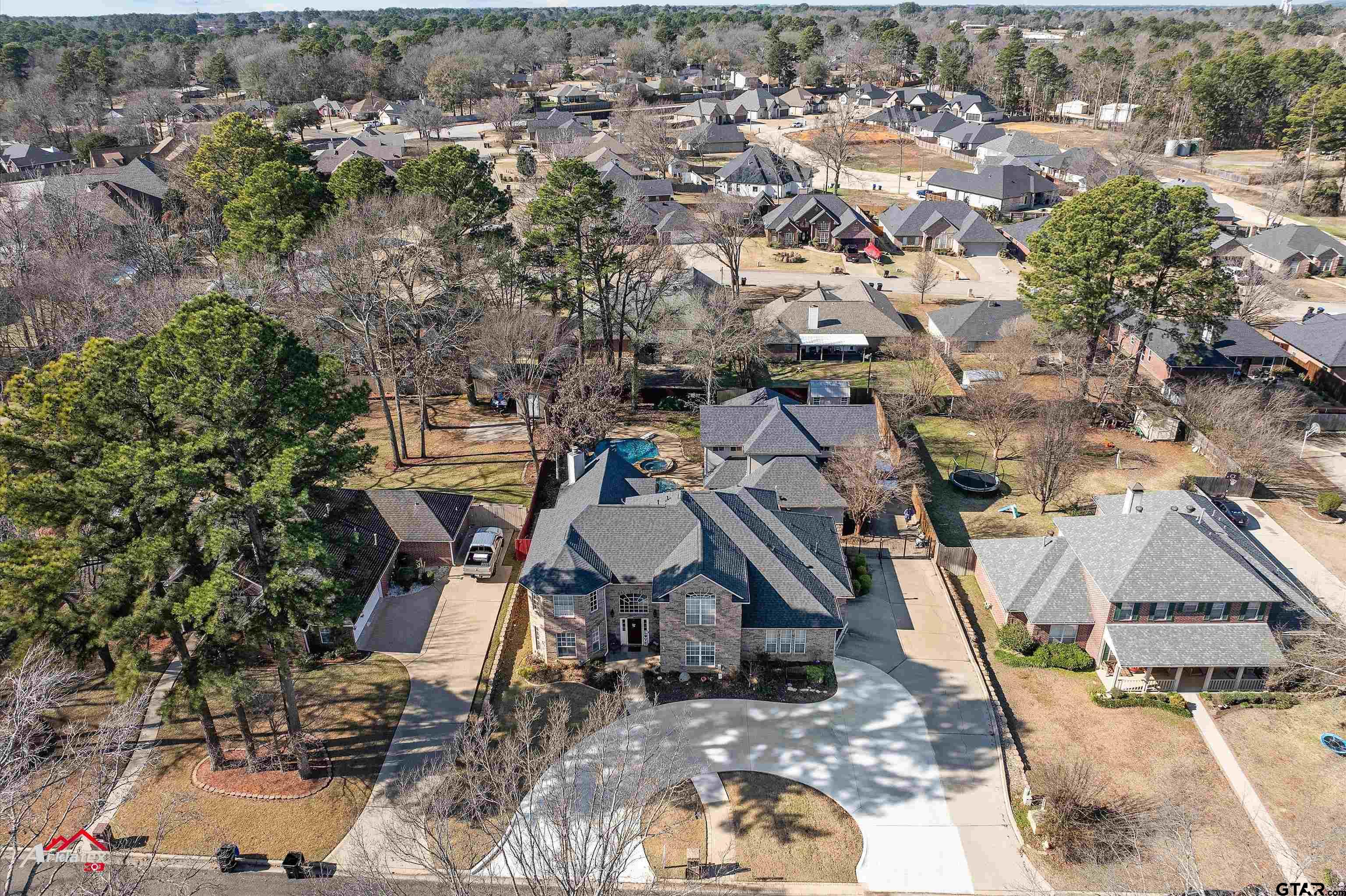 3815 Holly Ridge Drive Longview, TX 75605 - Photo 5 of 22 an aerial view of a house with swimming pool and sitting space