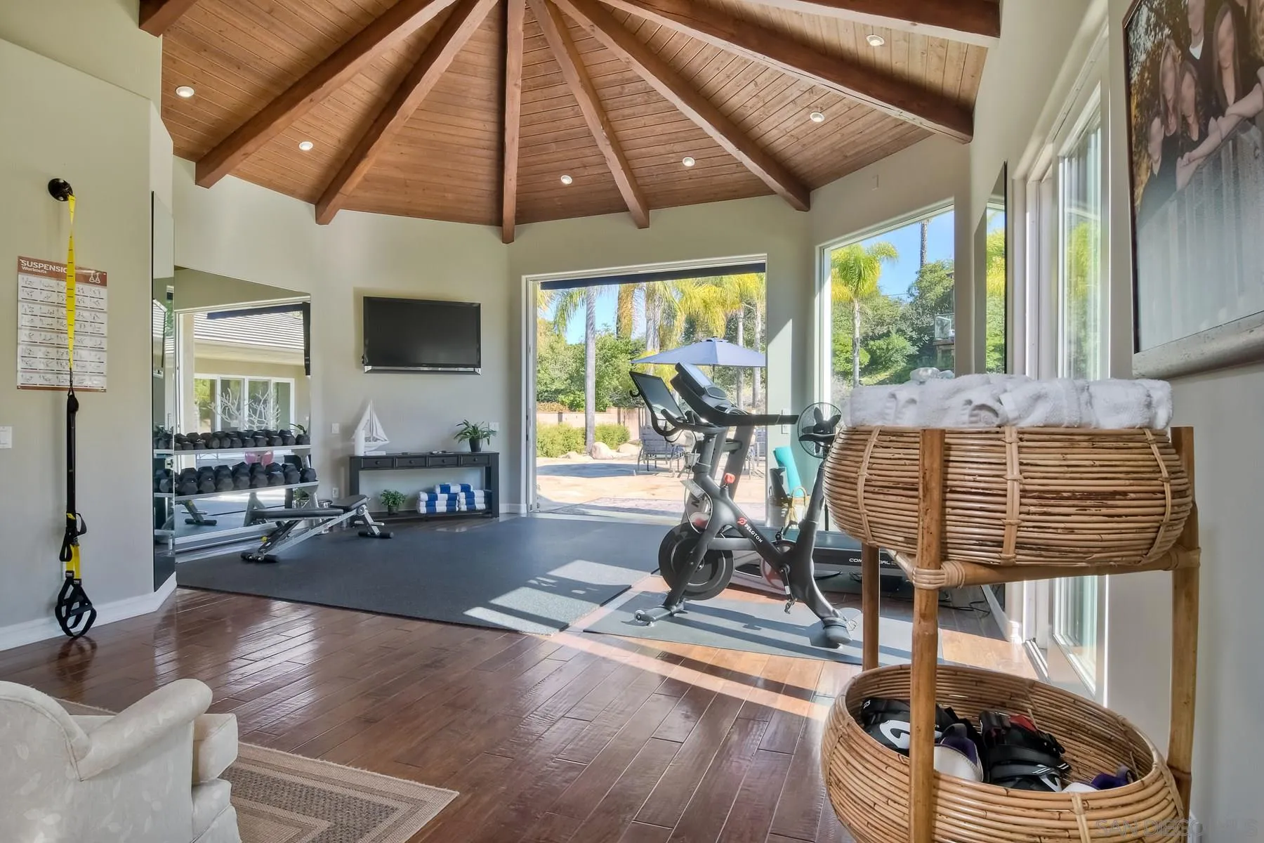 11739 Treadwell Drive Poway, CA 92064 - Photo 13 of 46 a living room with furniture a flat screen tv and a large window