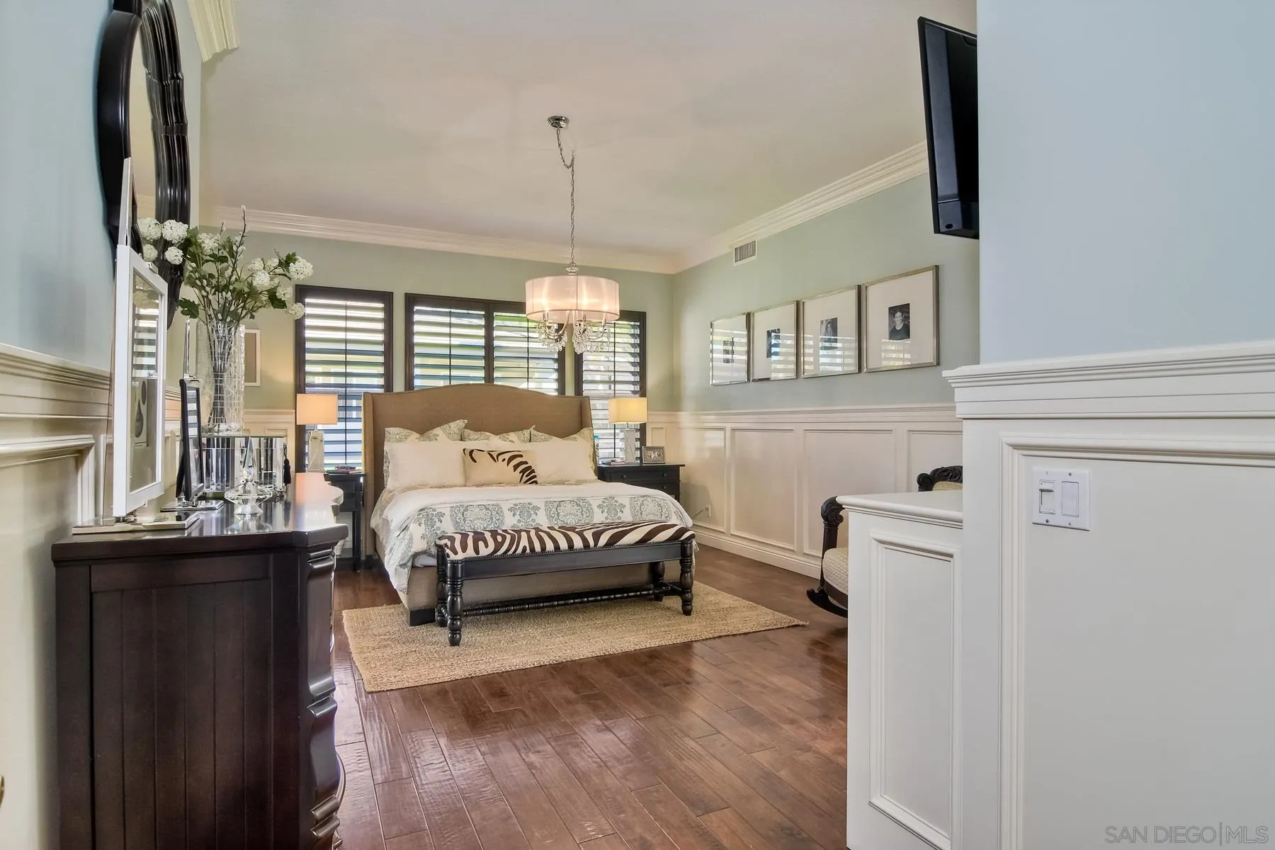 11739 Treadwell Drive Poway, CA 92064 - Photo 19 of 46 a bedroom with a bed and a flat tv screen on the dresser