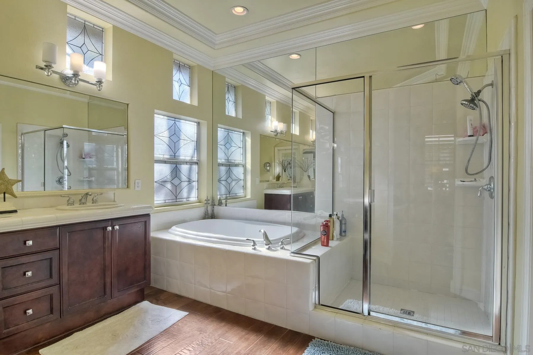 11739 Treadwell Drive Poway, CA 92064 - Photo 22 of 46 a bathroom with a granite countertop tub sink shower and mirror