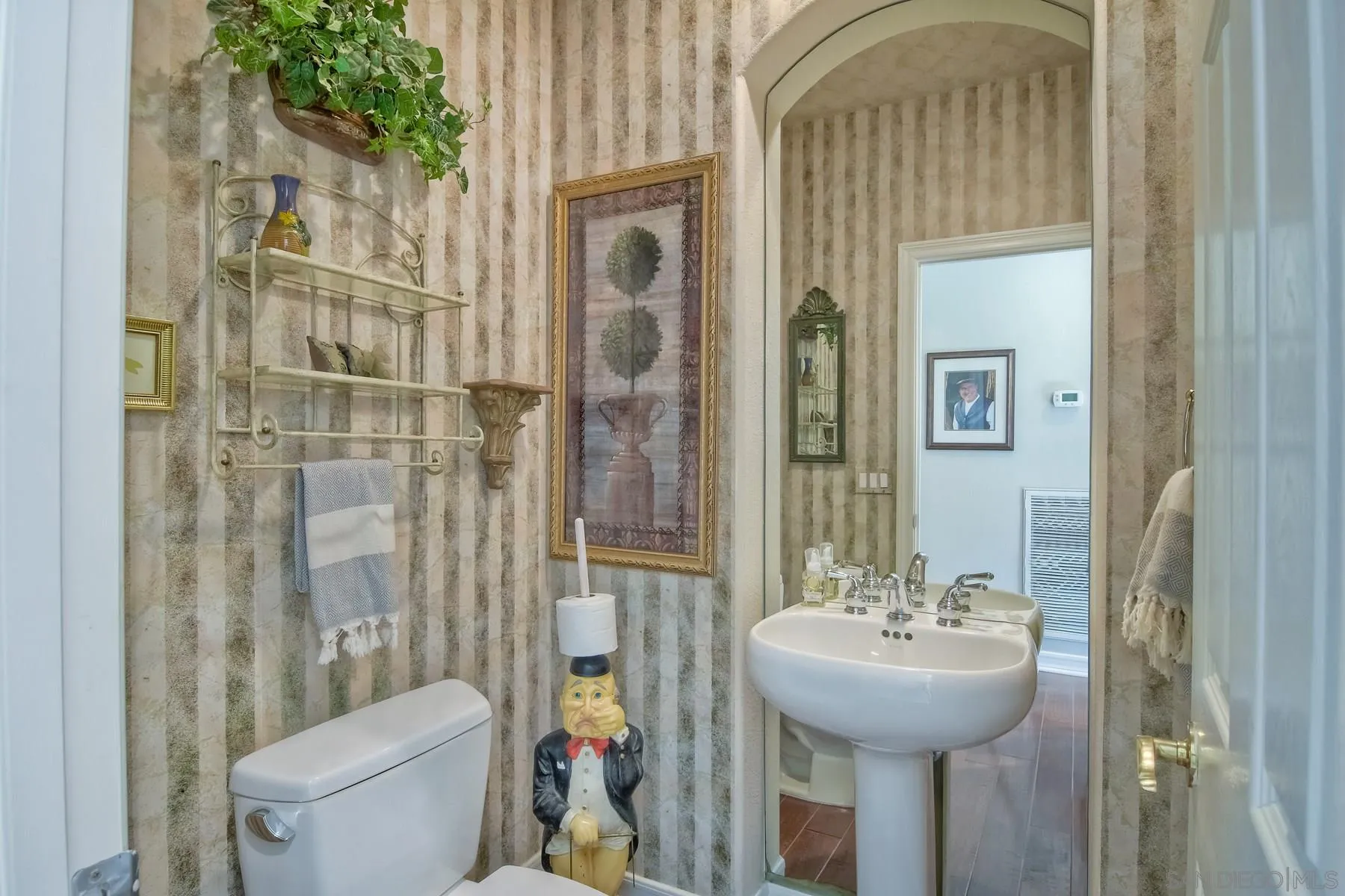 11739 Treadwell Drive Poway, CA 92064 - Photo 24 of 46 a bathroom with a sink toilet and shower