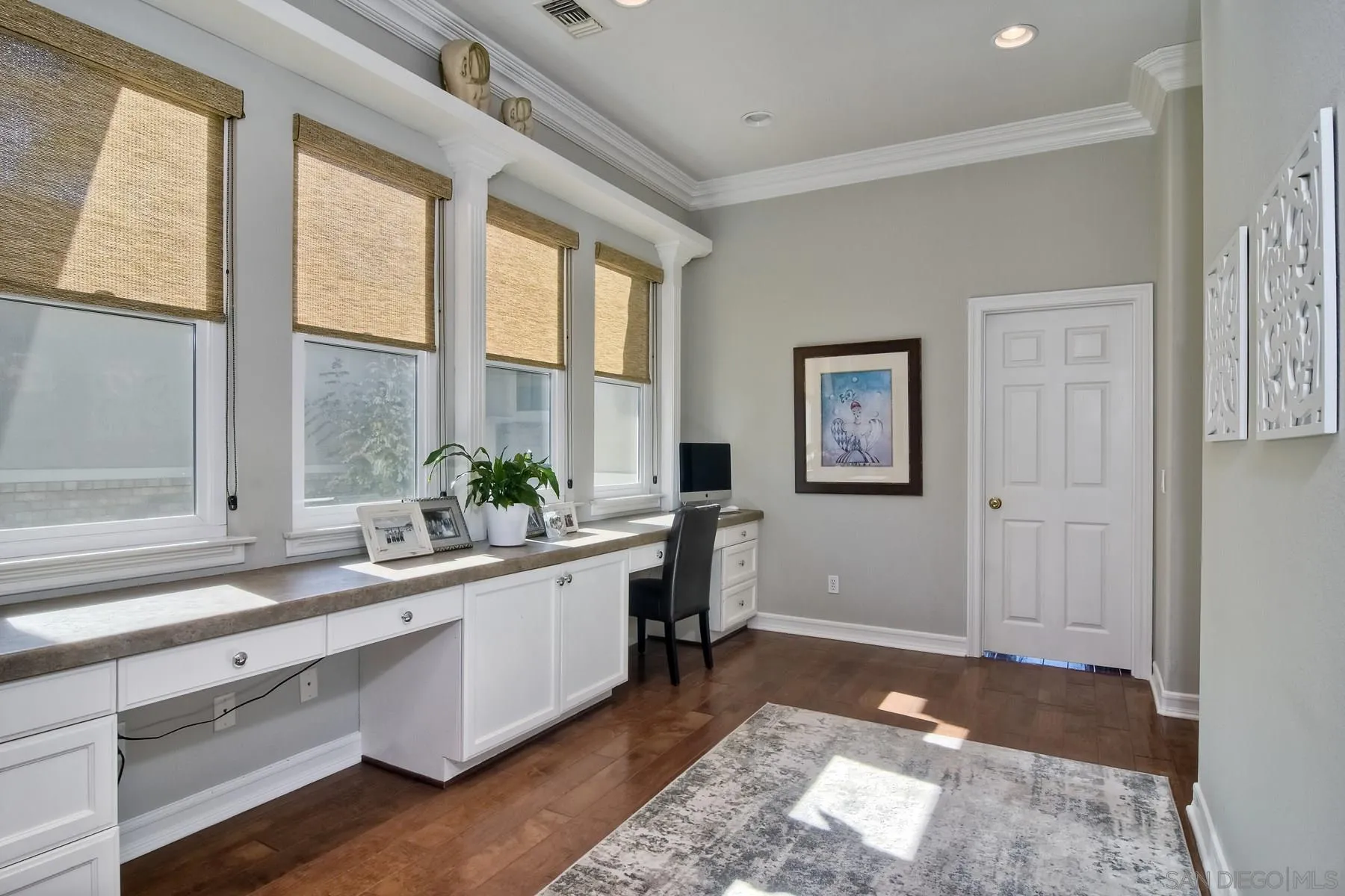11739 Treadwell Drive Poway, CA 92064 - Photo 25 of 46 a large white kitchen with a large window