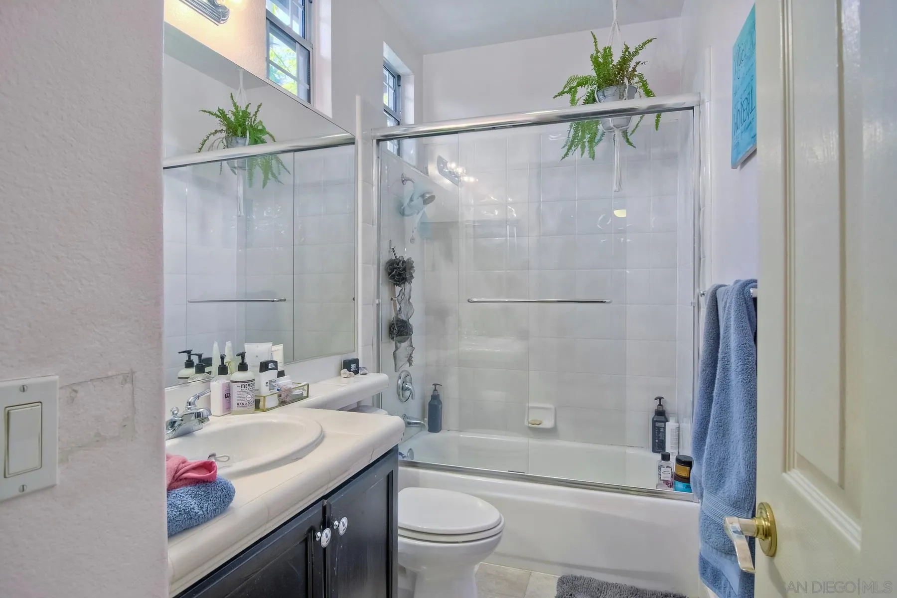 11739 Treadwell Drive Poway, CA 92064 - Photo 29 of 46 a bathroom with a sink toilet and shower