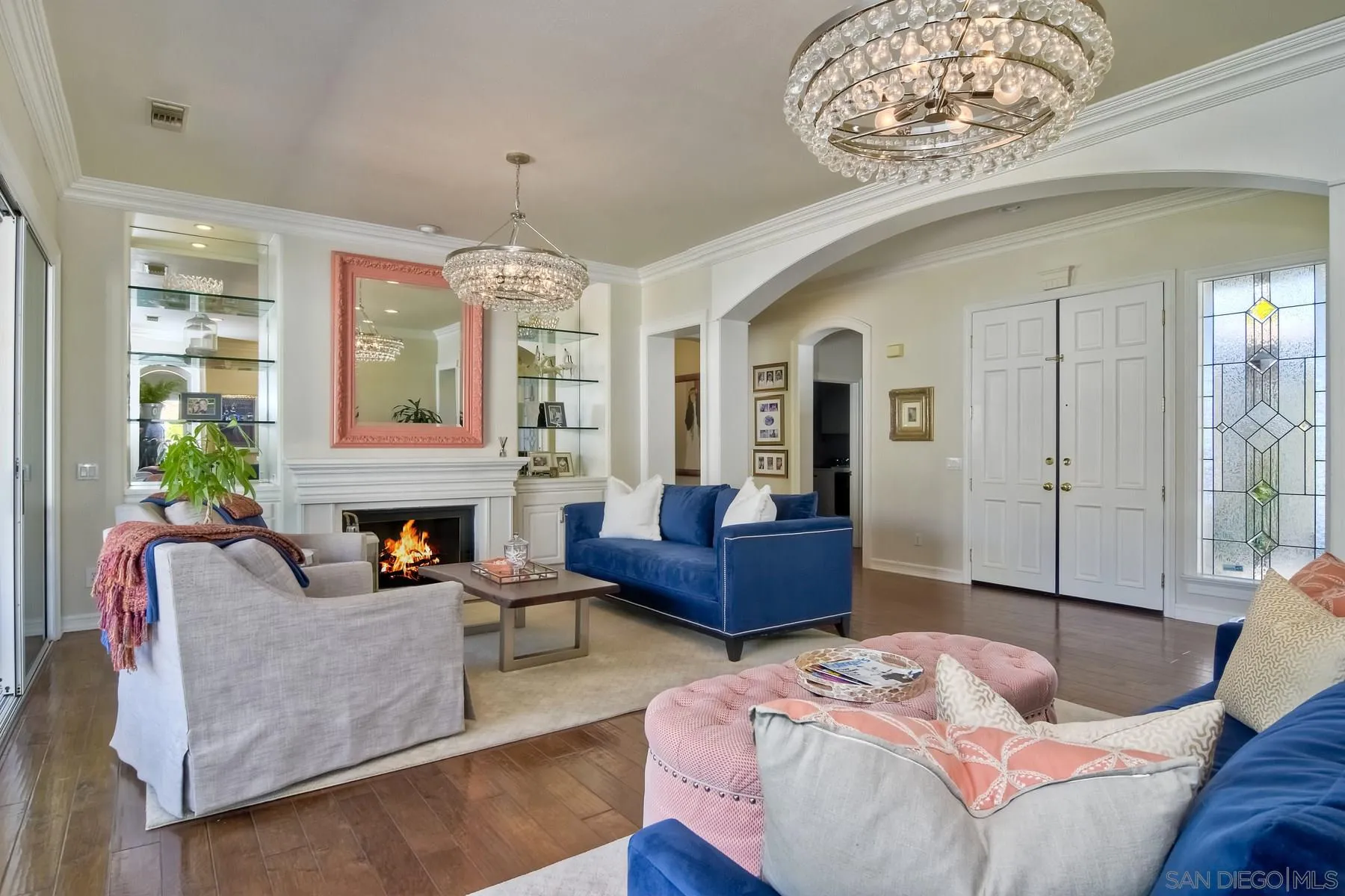 11739 Treadwell Drive Poway, CA 92064 - Photo 3 of 46 a living room with furniture a fireplace and a chandelier