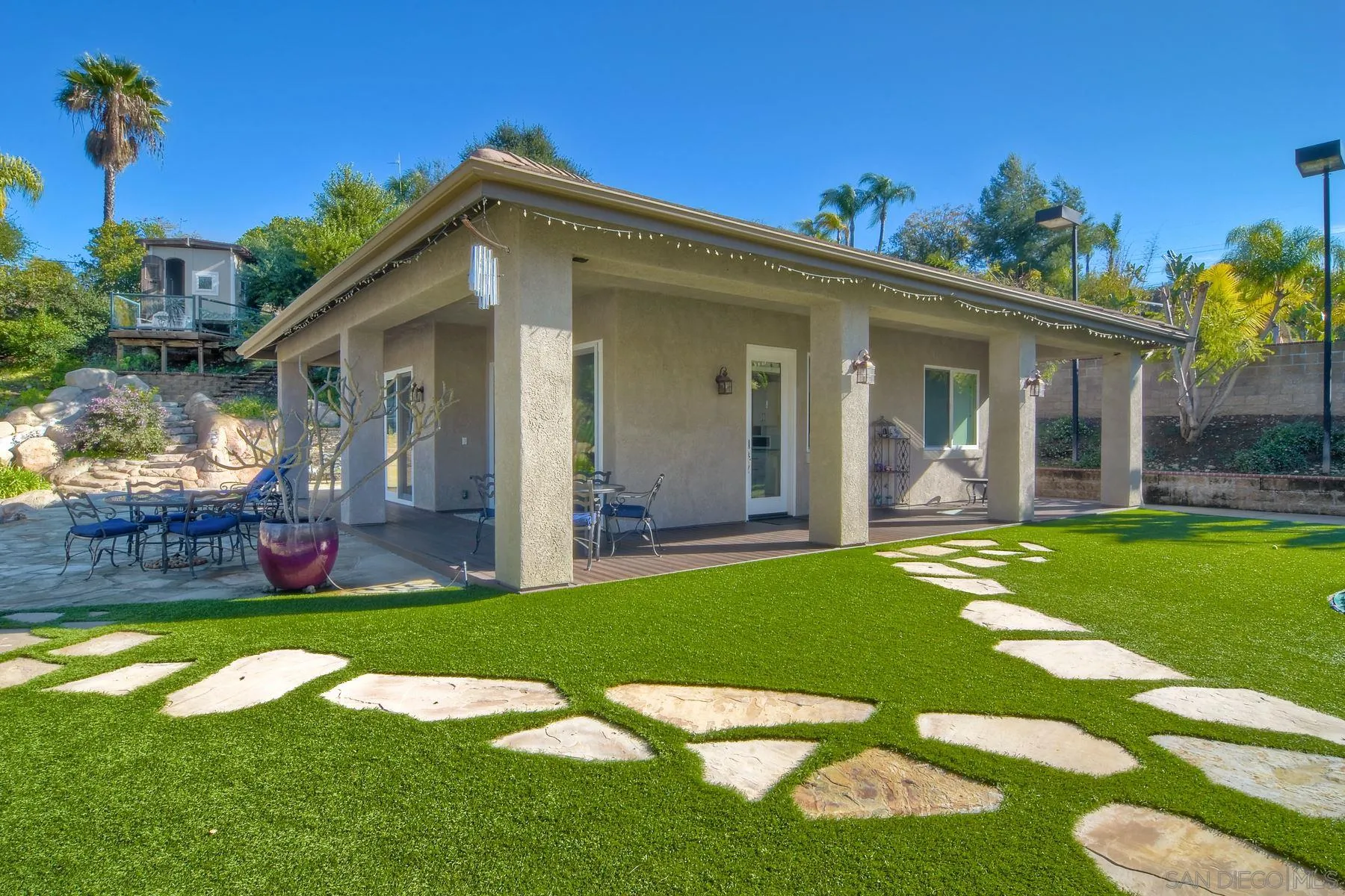 11739 Treadwell Drive Poway, CA 92064 - Photo 31 of 46 a view of a house with a yard porch and sitting area