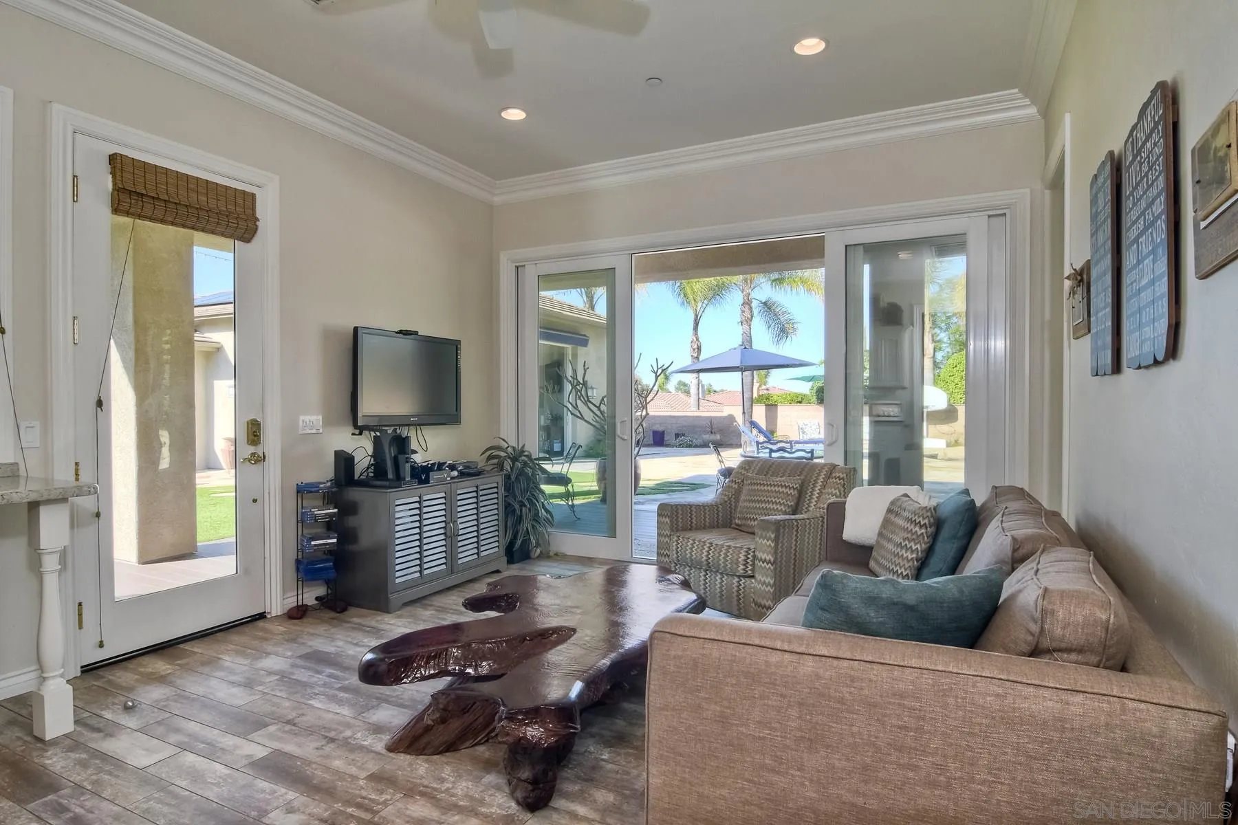 11739 Treadwell Drive Poway, CA 92064 - Photo 35 of 46 a living room with furniture and a flat screen tv