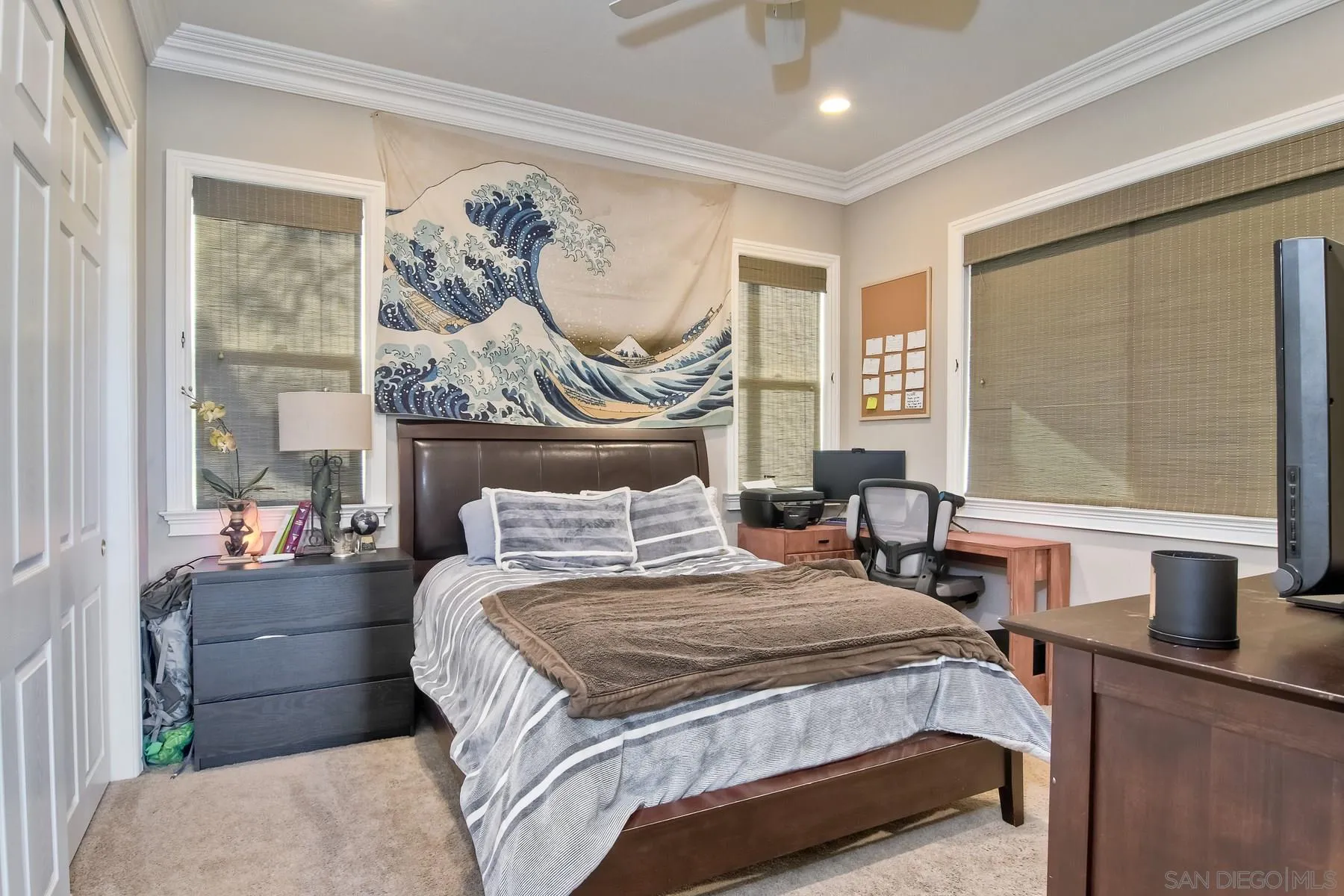 11739 Treadwell Drive Poway, CA 92064 - Photo 38 of 46 a bedroom with a large bed and a window