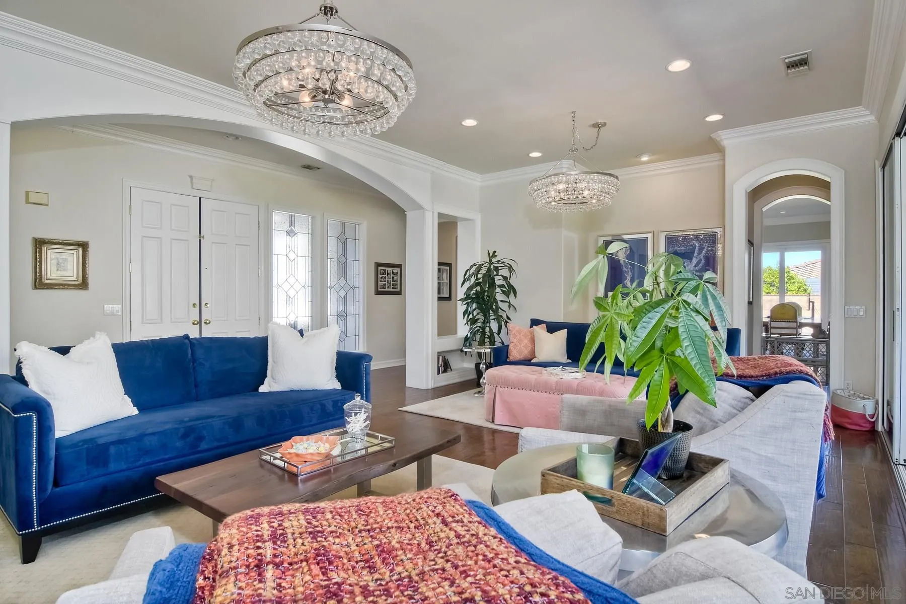 11739 Treadwell Drive Poway, CA 92064 - Photo 4 of 46 a living room with furniture and a chandelier