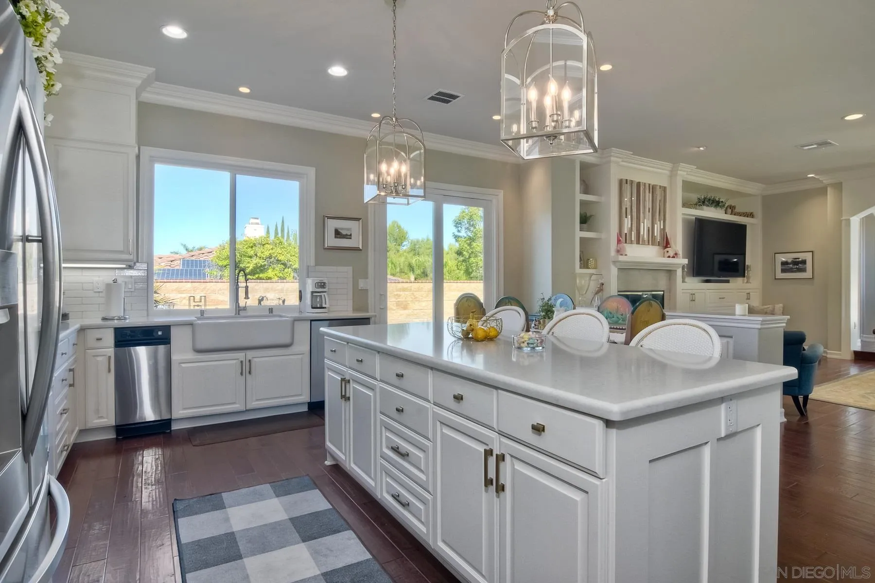 11739 Treadwell Drive Poway, CA 92064 - Photo 7 of 46 a kitchen with stainless steel appliances a sink stove and refrigerator